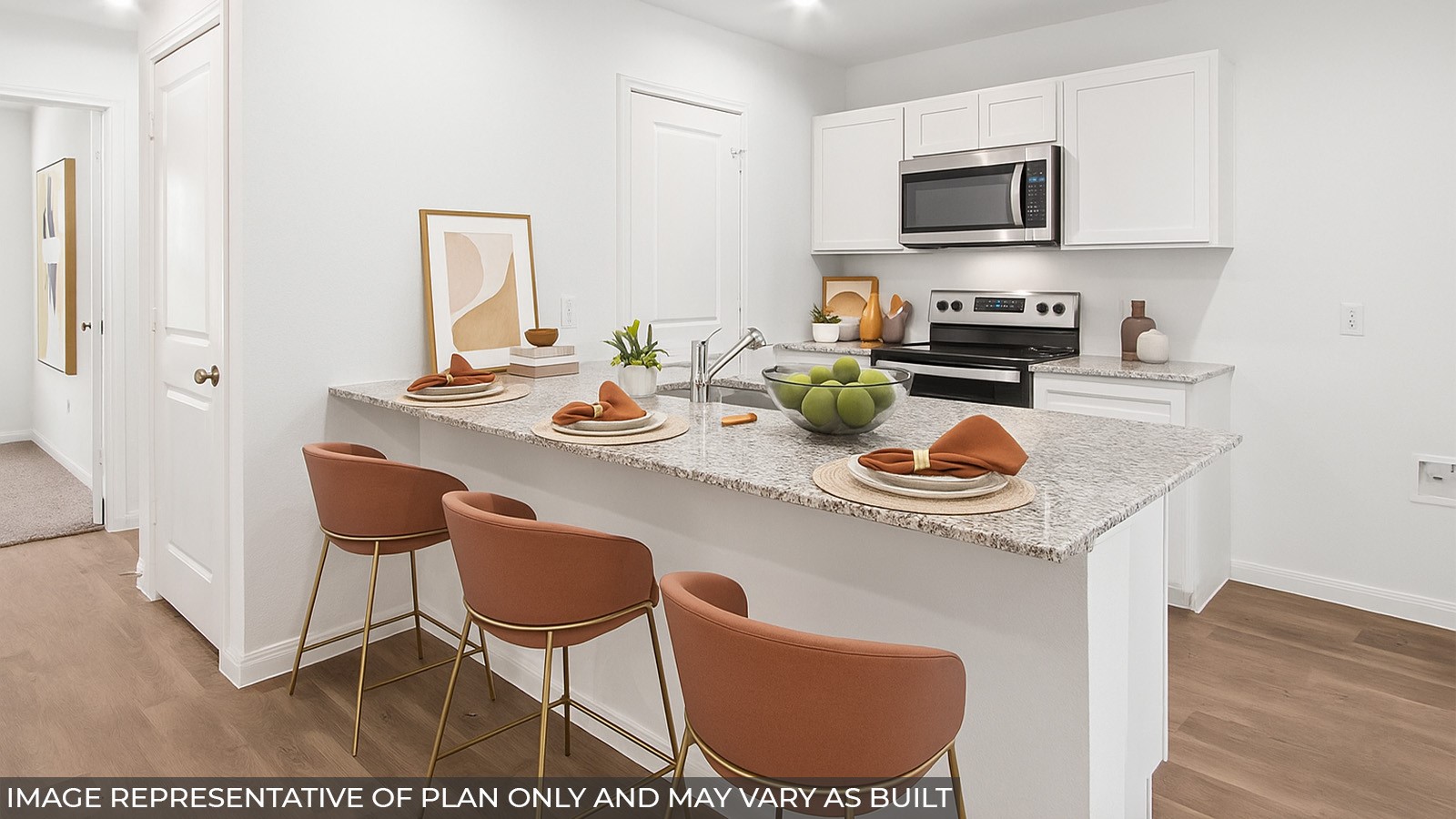 2409 Twin Court Splendora, TX 77372 - Photo 2 of 10 a kitchen with a sink a stove and chairs with wooden floor