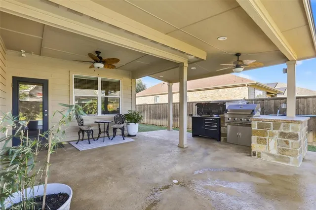 a view of a chairs and table in a room