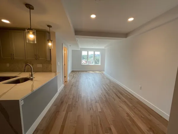 a bathroom with a sink a mirror and a bathtub