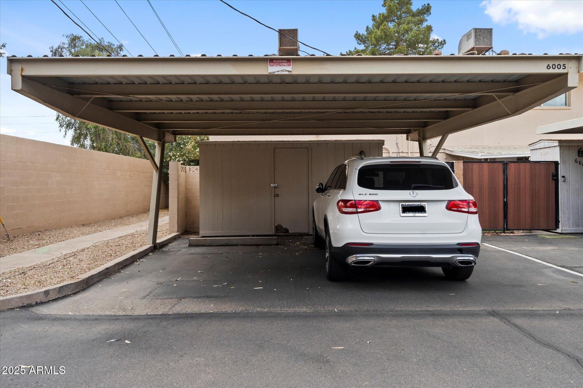 6005 North Granite Reef Road Scottsdale, AZ 85250 - Photo 15 of 19 a car parked in garage
