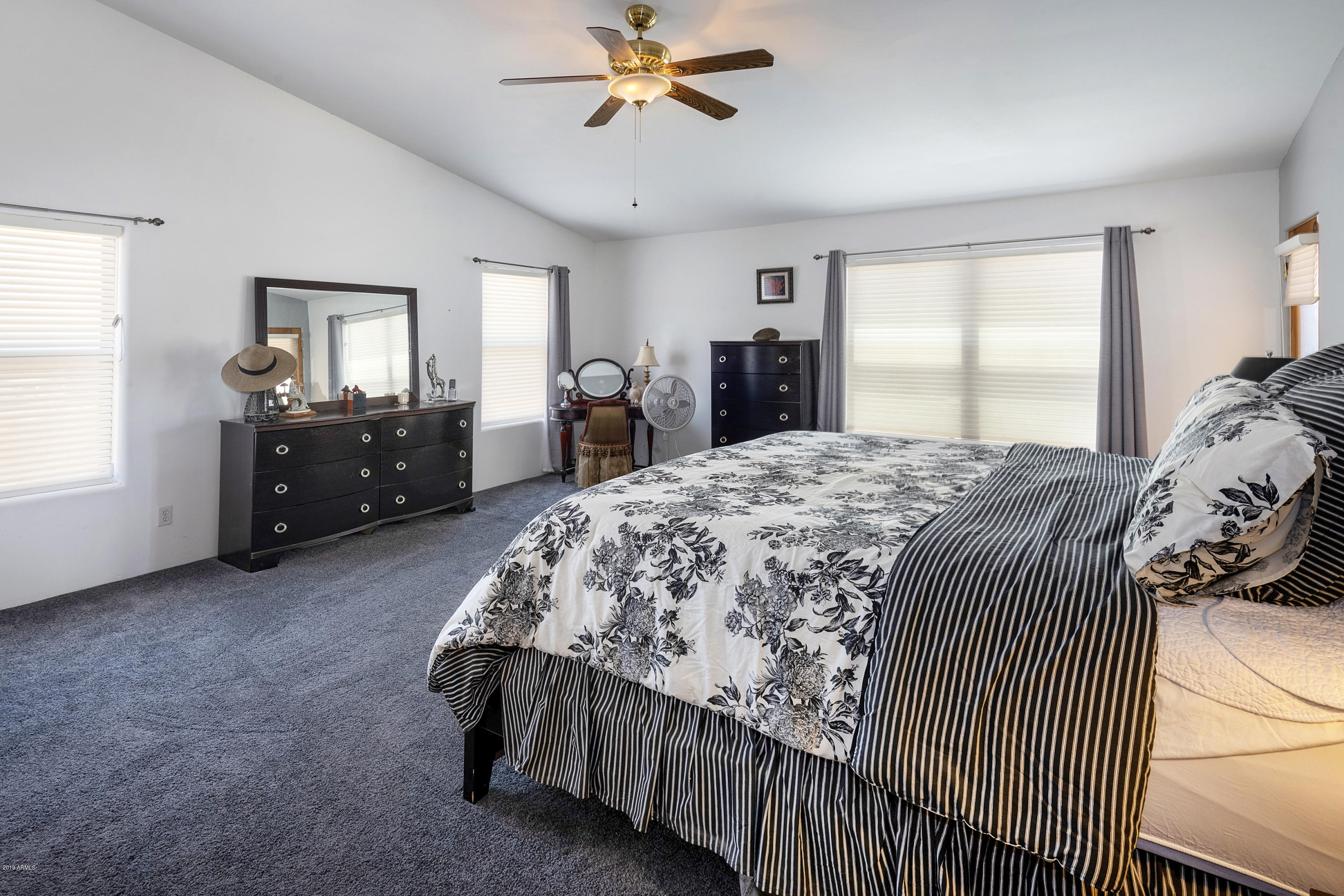 13849 East Hawknest Road Scottsdale, AZ 85262 - Photo 23 of 52 a bedroom with a bed and window