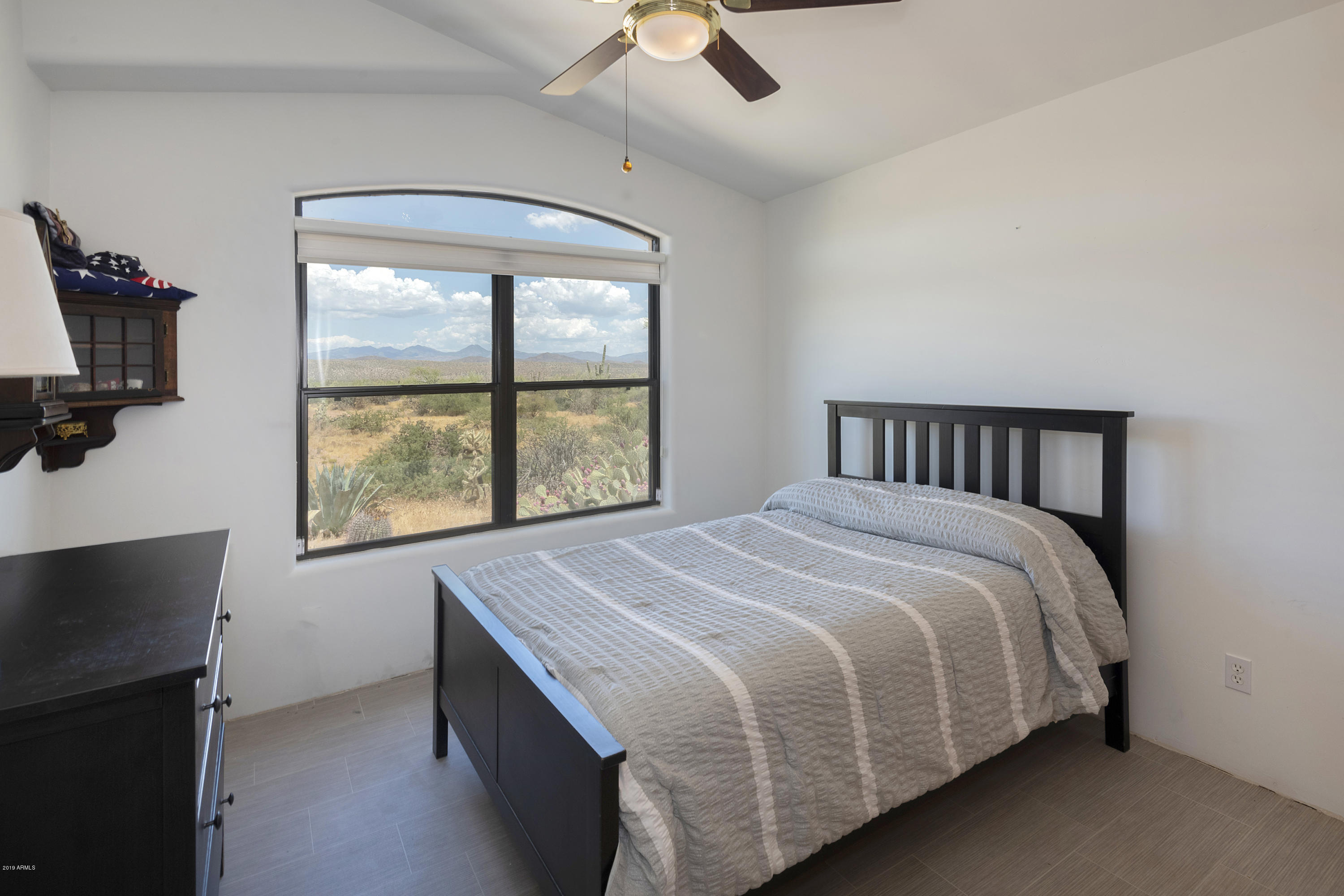 13849 East Hawknest Road Scottsdale, AZ 85262 - Photo 29 of 52 a bedroom with a bed and a window
