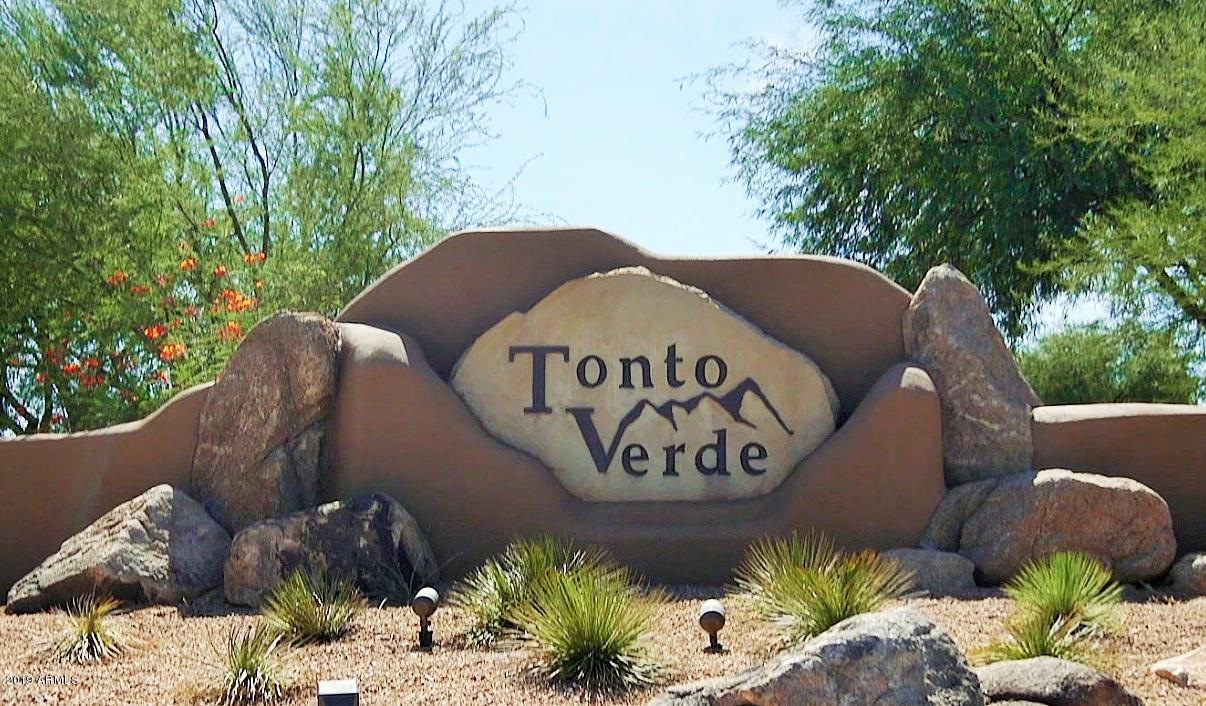 13849 East Hawknest Road Scottsdale, AZ 85262 - Photo 52 of 52 a wooden bench sitting in a yard