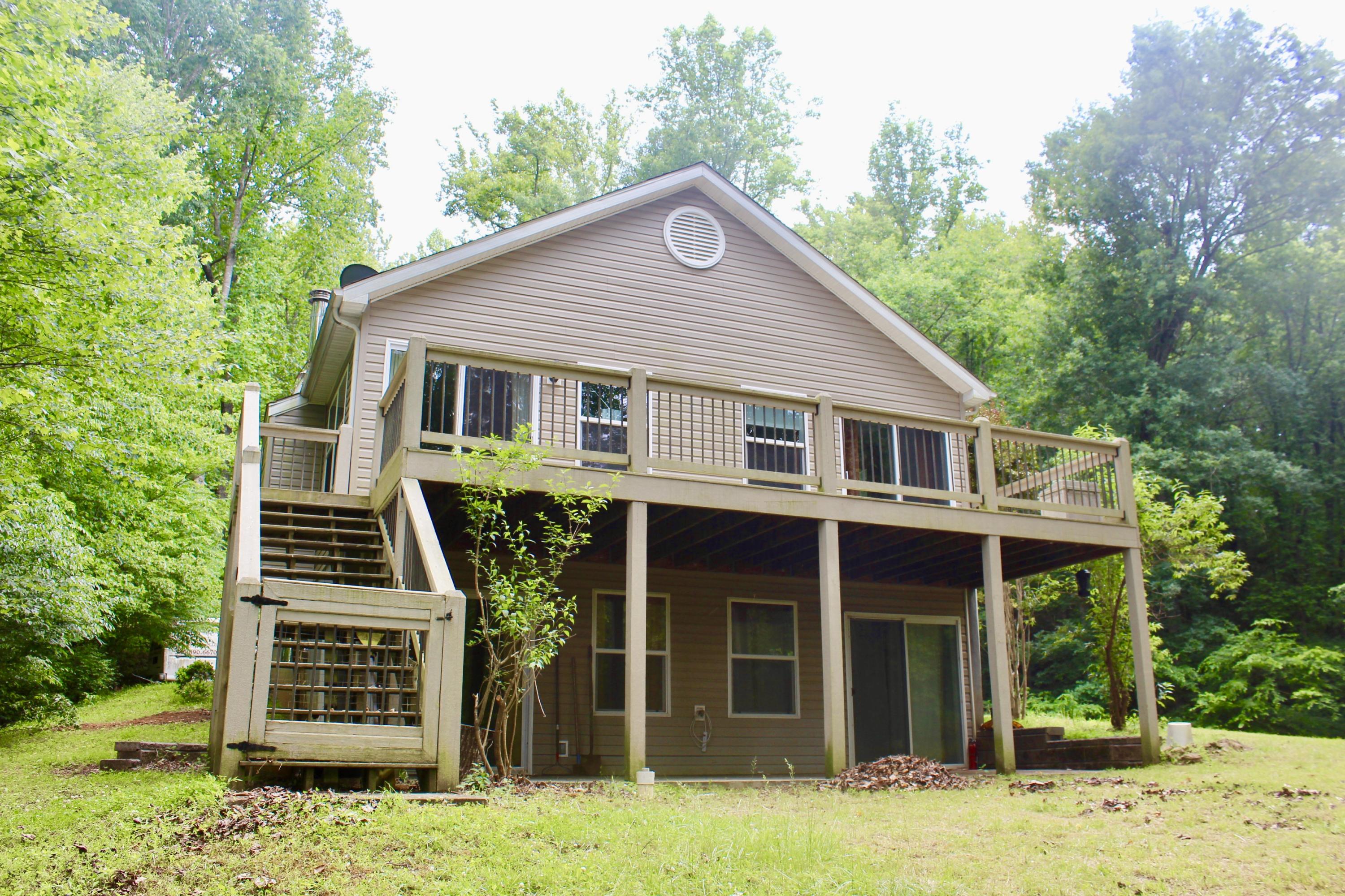 224 Board Mountain Road Goodview, VA 24095 - Photo 3 of 17 a front view of a house with a yard
