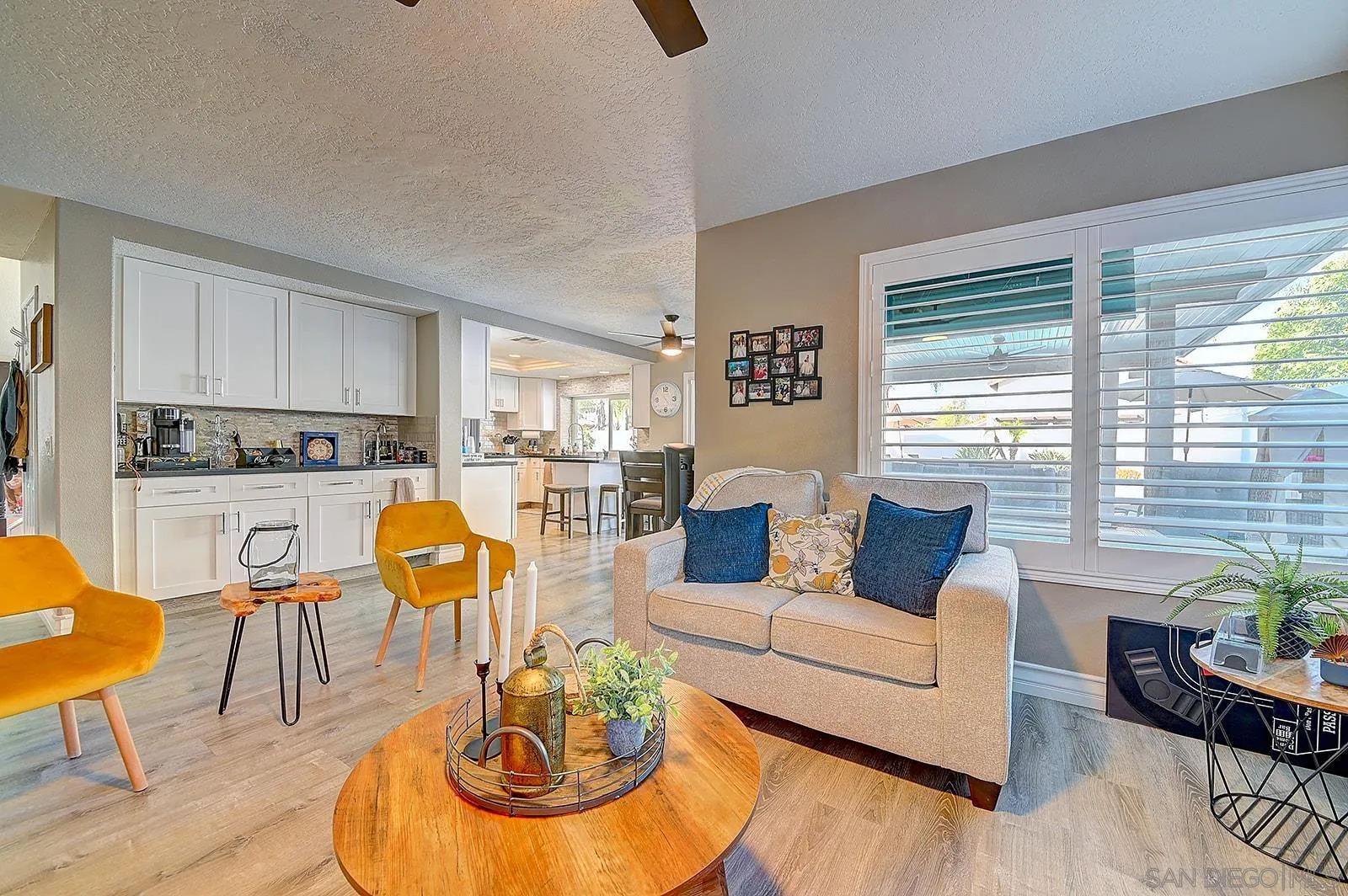 45774 Hopactong Street Temecula, CA 92592 - Photo 13 of 26 a living room with furniture kitchen and a table