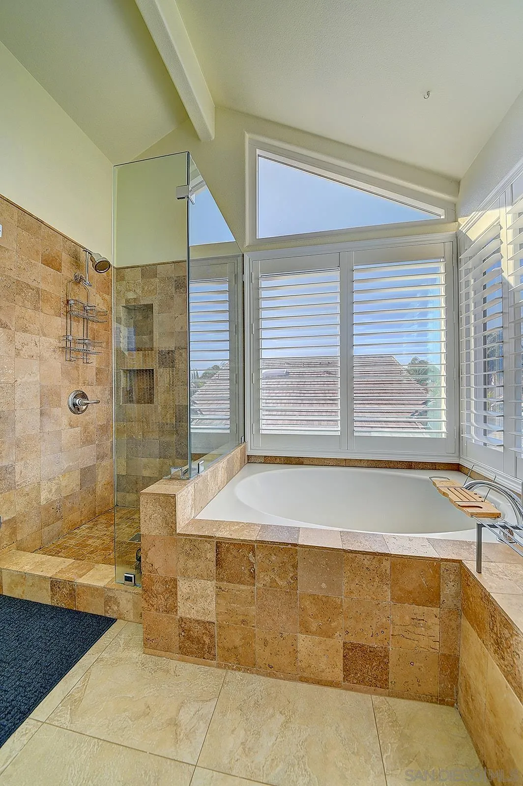 45774 Hopactong Street Temecula, CA 92592 - Photo 18 of 26 a bathroom with a bathtub and window