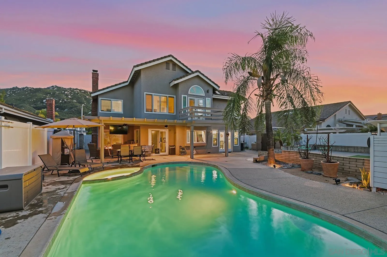 45774 Hopactong Street Temecula, CA 92592 - Photo 4 of 26 a view of a house with swimming pool and sitting area