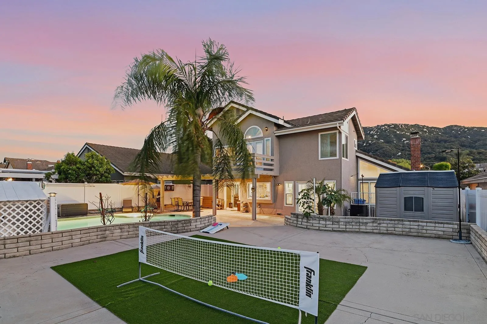 45774 Hopactong Street Temecula, CA 92592 - Photo 6 of 26 a view of a house with a swimming pool
