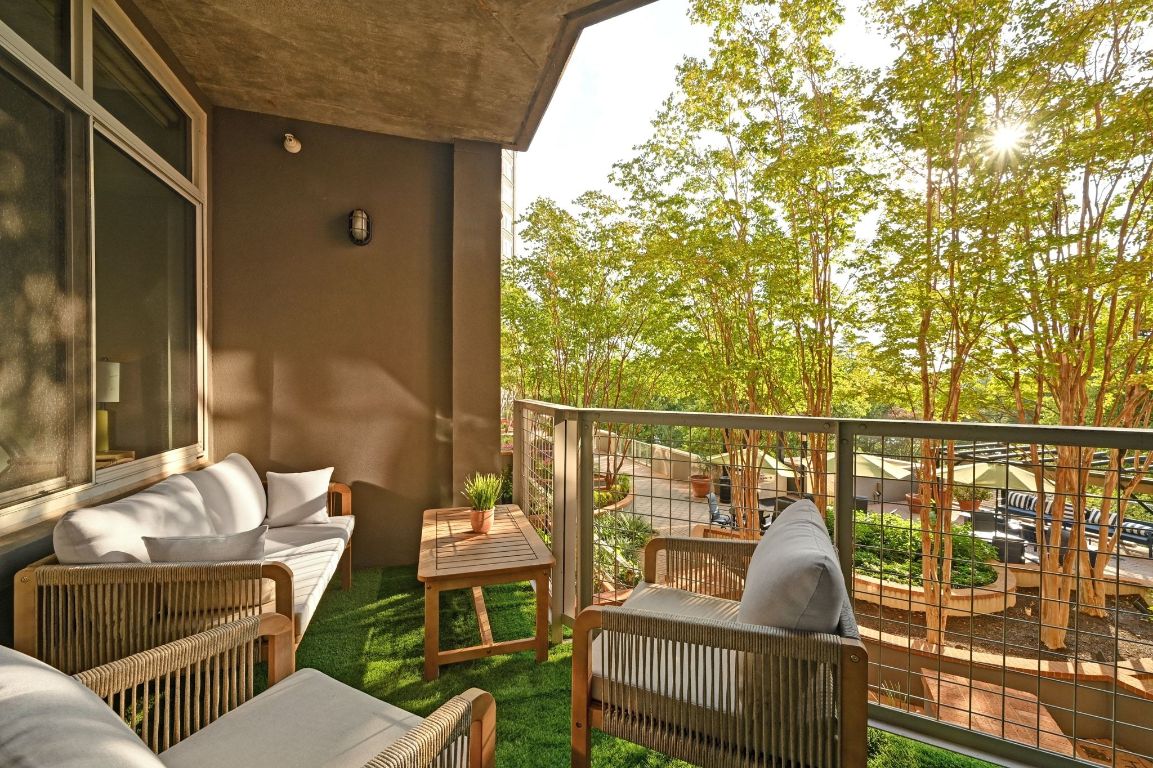 54 Rainey Street, Unit 416 Austin, TX 78701 - Photo 17 of 40 Balcony featuring an outdoor living space