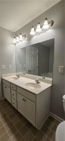 a view of a backyard with a lake view