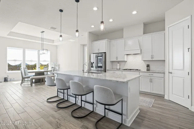a bedroom with a bed and a flat screen television