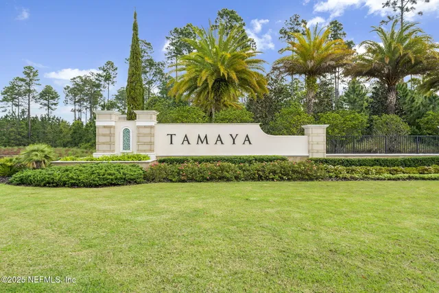a view of a street with a building in the background