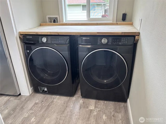 a utility room with dryer and washer