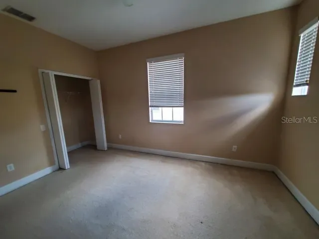 an empty room with windows