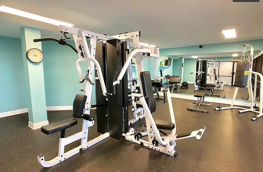 6009 Sea Ranch Drive, Unit 208 Hudson, FL 34667 - Photo 19 of 22 a view of a room with gym equipment