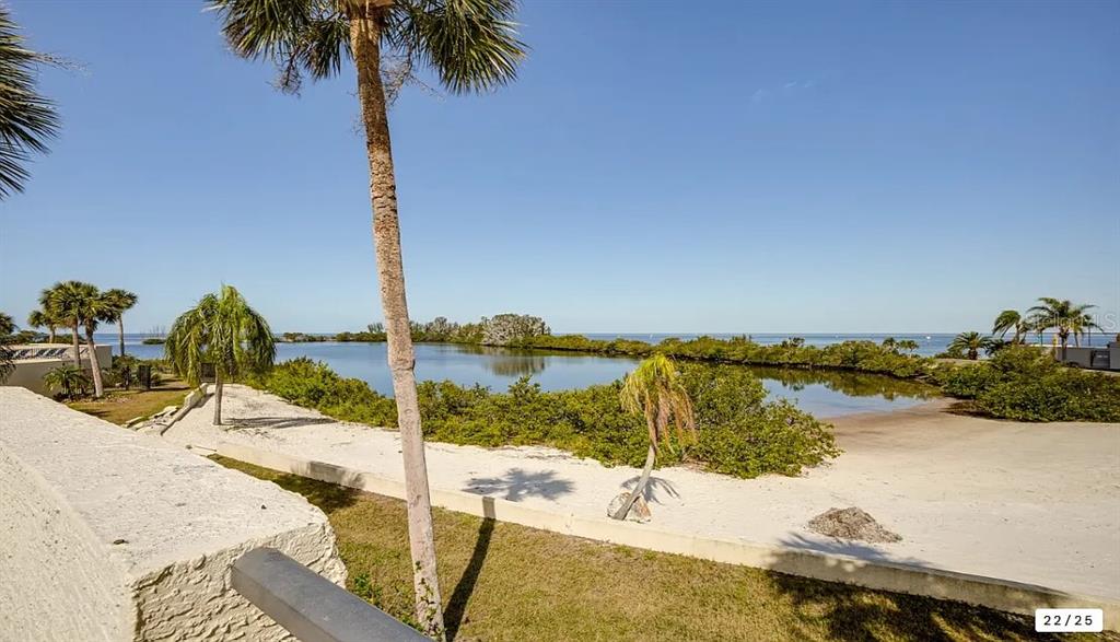 6009 Sea Ranch Drive, Unit 208 Hudson, FL 34667 - Photo 2 of 22 a ocean view with beach and ocean view