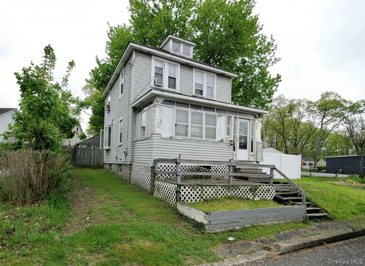 809 South Street Newburgh, NY 12550 - Photo 1 of 45 a view of a house with a yard and deck