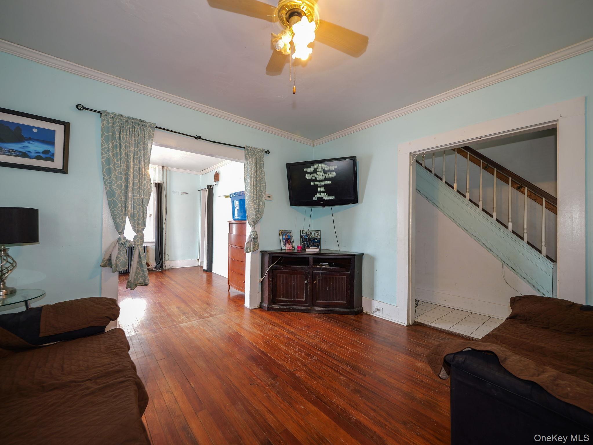 809 South Street Newburgh, NY 12550 - Photo 12 of 45 a living room with furniture and a flat screen tv