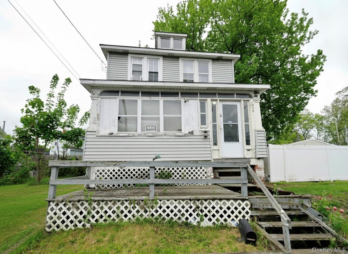 809 South Street Newburgh, NY 12550 - Photo 2 of 45 a view of a brick house with a yard