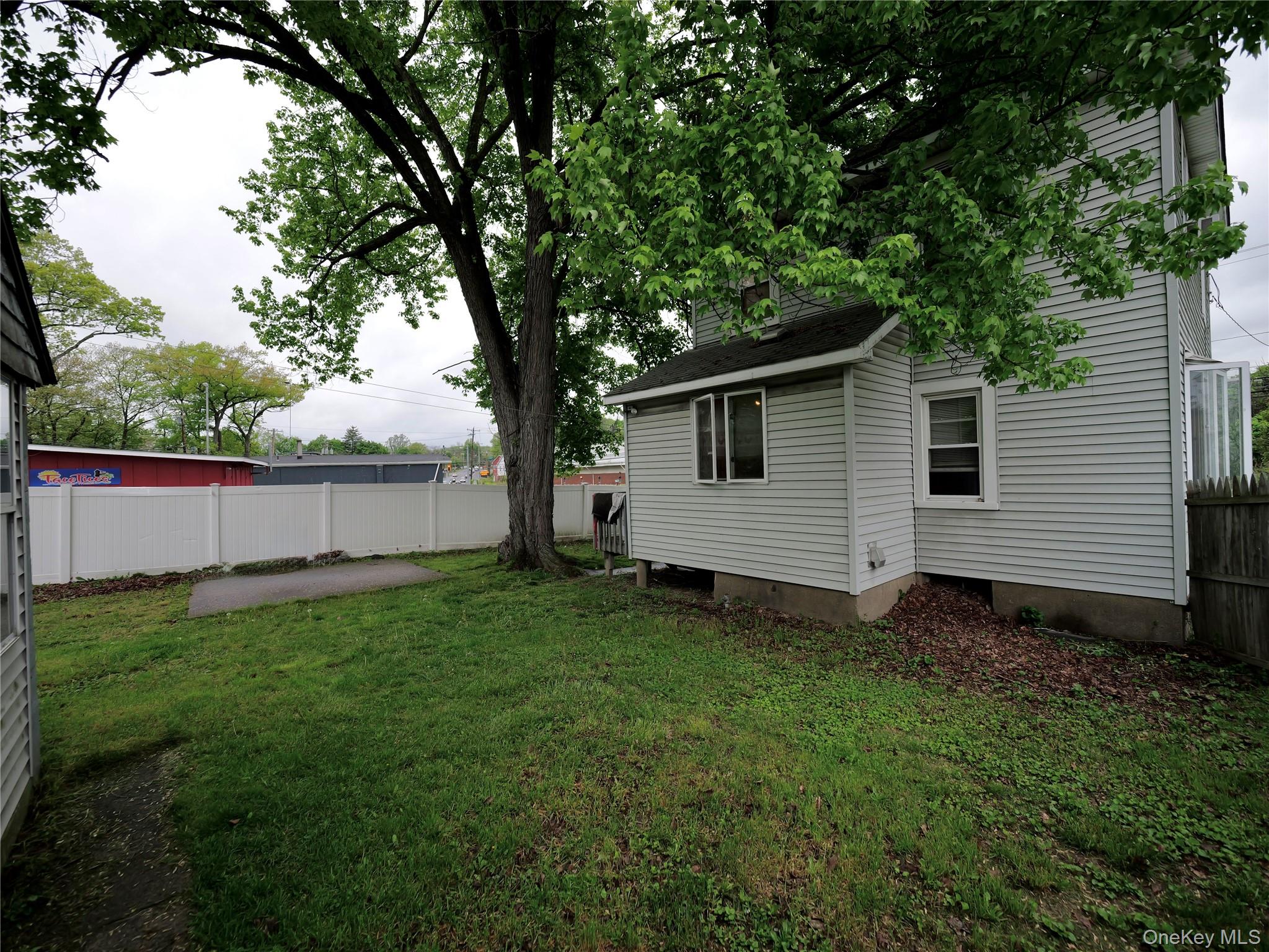 809 South Street Newburgh, NY 12550 - Photo 26 of 45 a view of a backyard with large trees