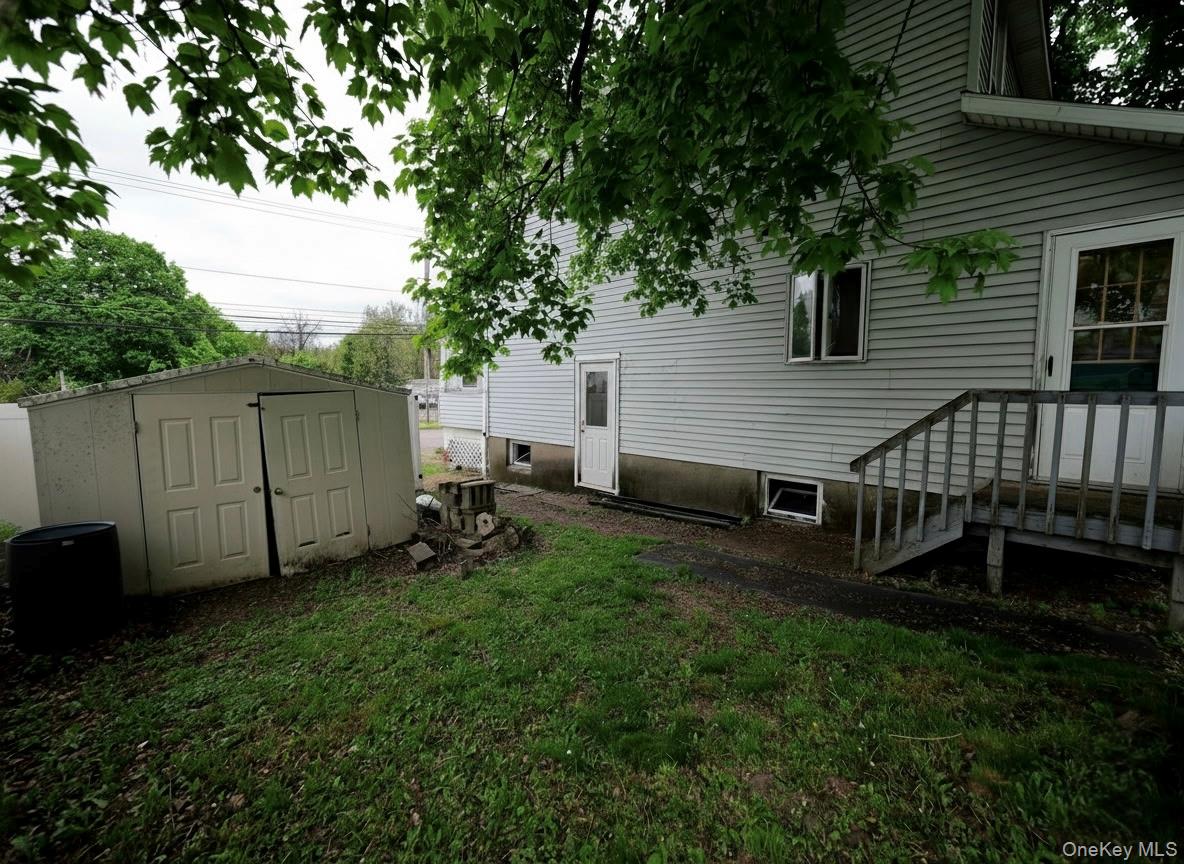 809 South Street Newburgh, NY 12550 - Photo 27 of 45 a view of backyard with deck and garden