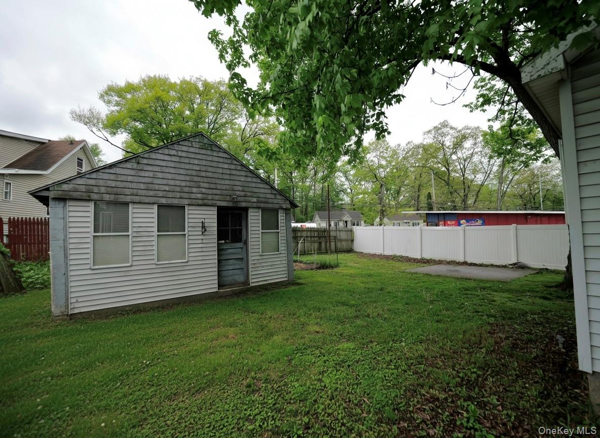 809 South Street Newburgh, NY 12550 - Photo 28 of 45 a front view of a house with a garden