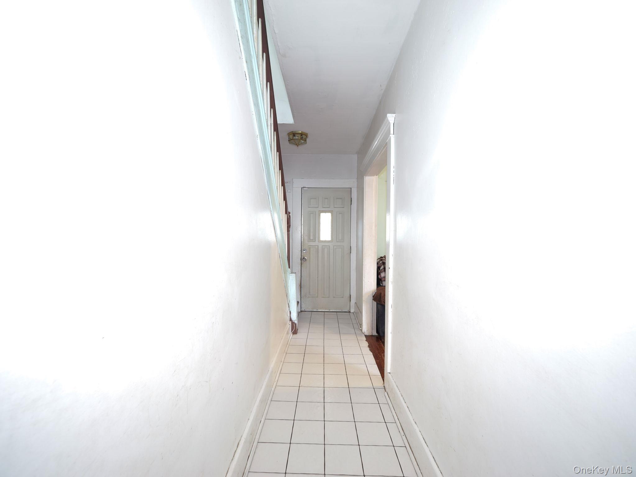 809 South Street Newburgh, NY 12550 - Photo 33 of 45 a view of a hallway with a white walls
