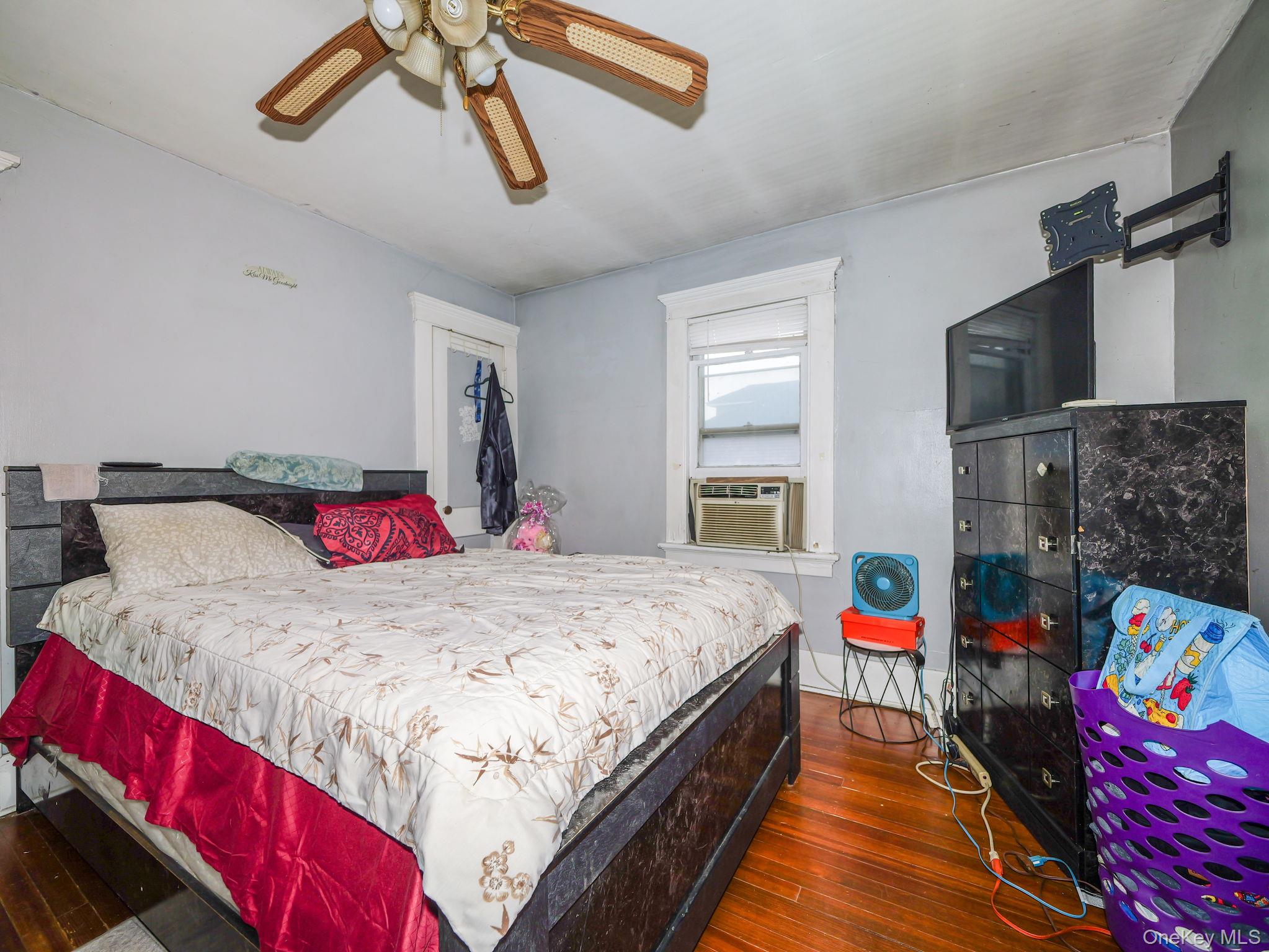 809 South Street Newburgh, NY 12550 - Photo 36 of 45 a bedroom with bed and a chandelier