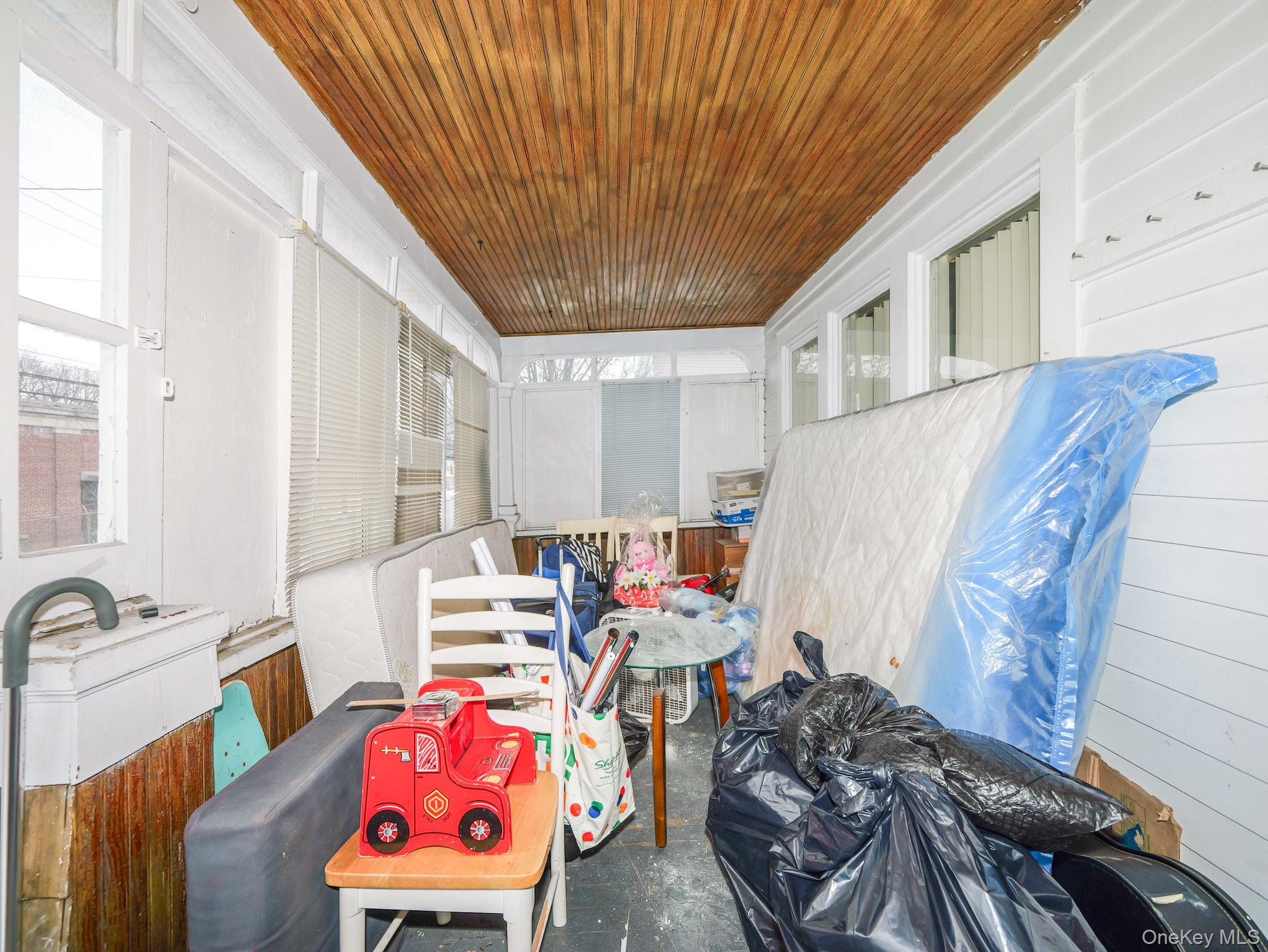 809 South Street Newburgh, NY 12550 - Photo 41 of 45 a bedroom with furniture and a wooden floor