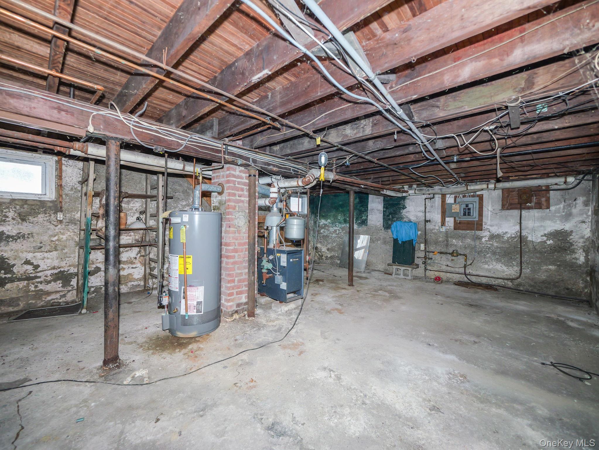 809 South Street Newburgh, NY 12550 - Photo 42 of 45 a view of water heater room with refrigerator