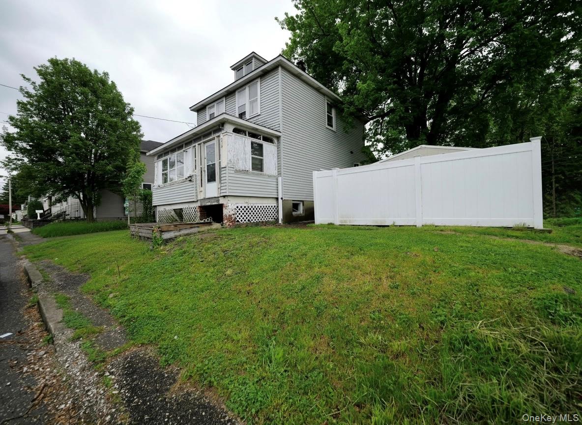 809 South Street Newburgh, NY 12550 - Photo 44 of 45 a white house that has a tree in front of it