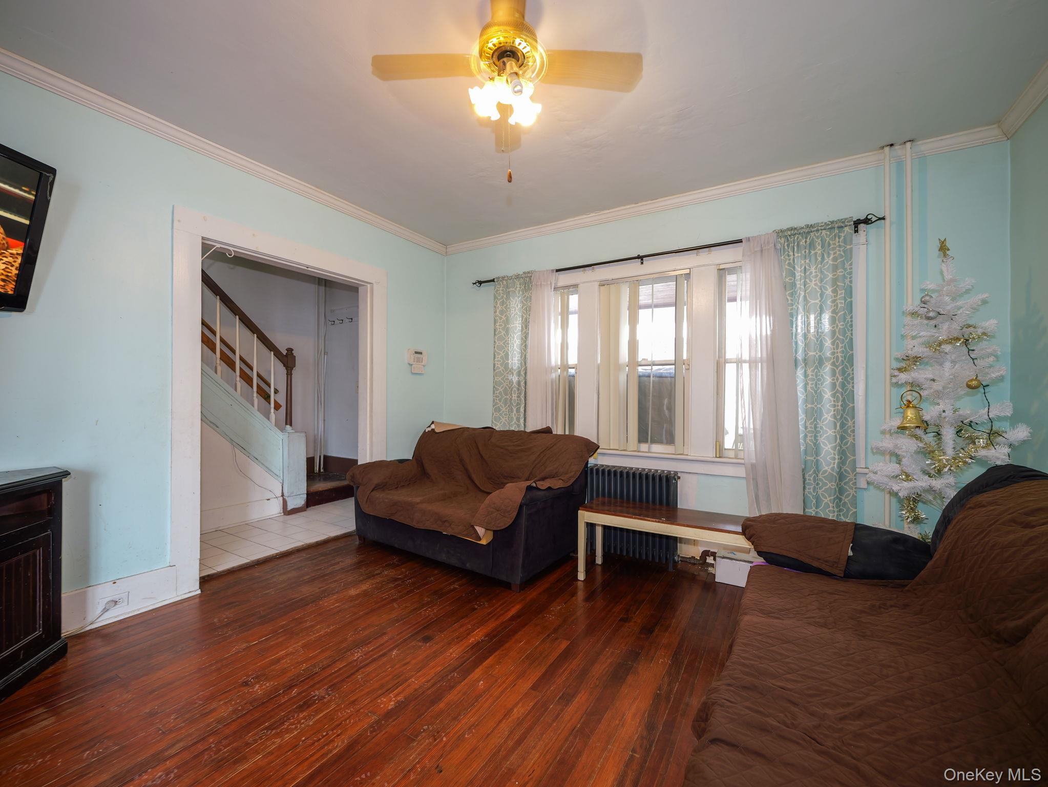 809 South Street Newburgh, NY 12550 - Photo 9 of 45 a living room with furniture and a window