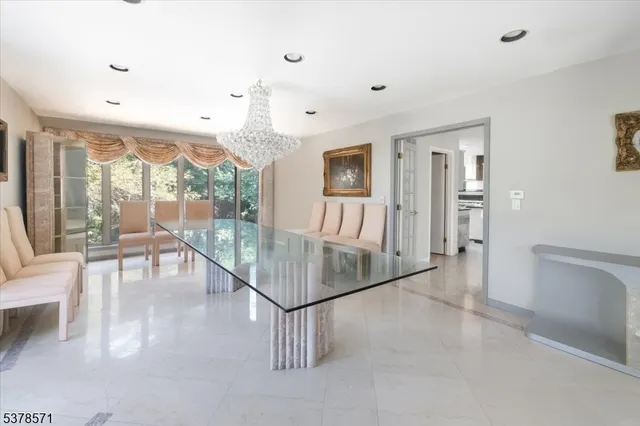 a view of a living room and dining room