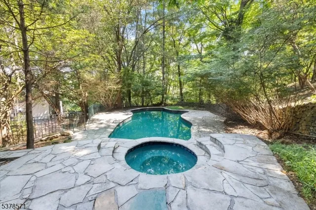 a front view of a house with a garage