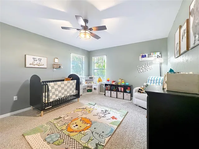 a bathroom with a sink and a shower curtain