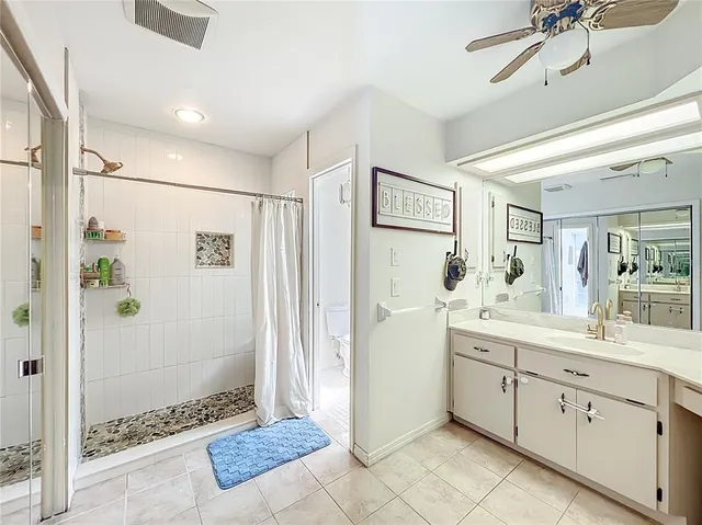 a lobby with furniture and floor to ceiling window