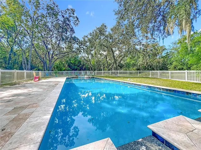 a front view of a house with a garage