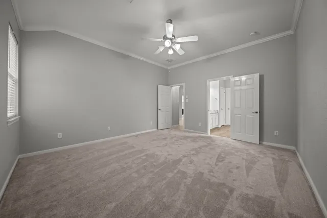 a spacious bathroom with a tub shower and sink