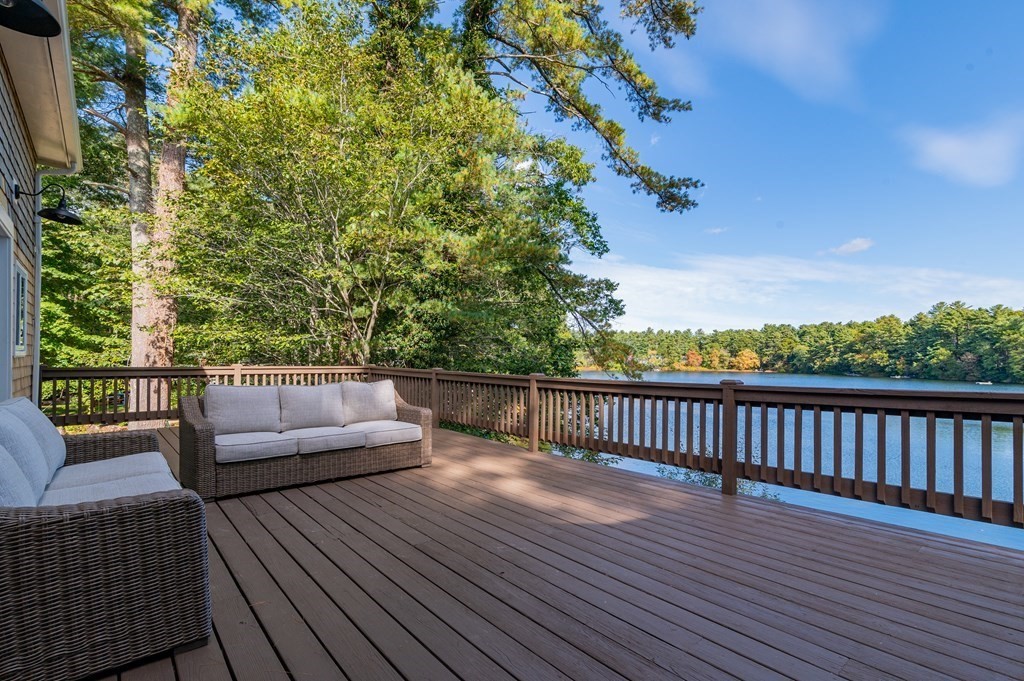 46 Oak Place Halifax, MA 02338 - Photo 13 of 42 a balcony with wooden floor and furniture