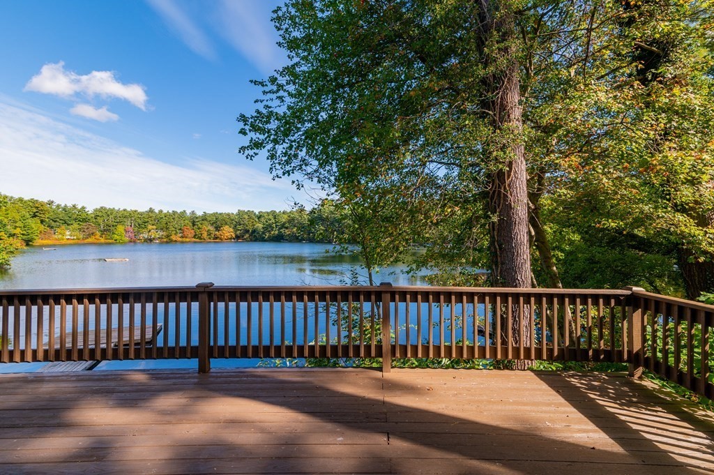 46 Oak Place Halifax, MA 02338 - Photo 15 of 42 a balcony with wooden floor and fence