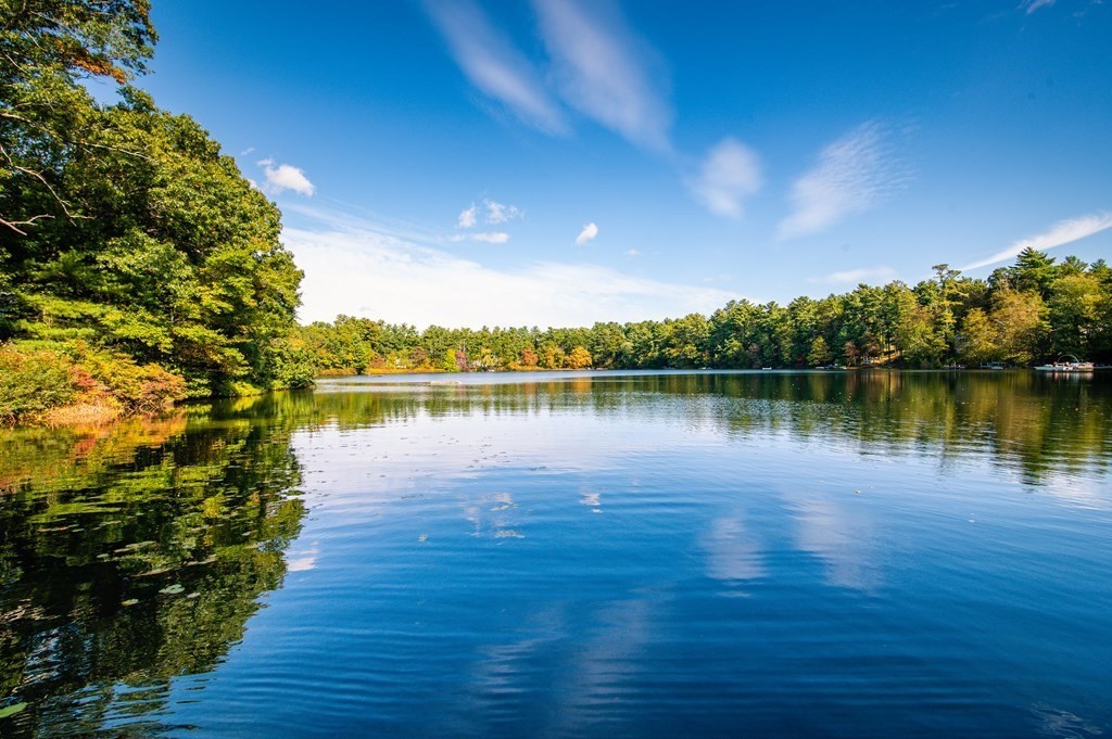 46 Oak Place Halifax, MA 02338 - Photo 16 of 42 a view of a lake with houses in the back