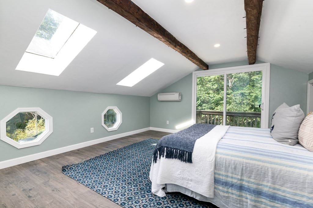 46 Oak Place Halifax, MA 02338 - Photo 20 of 42 a bedroom with a bed and a large window