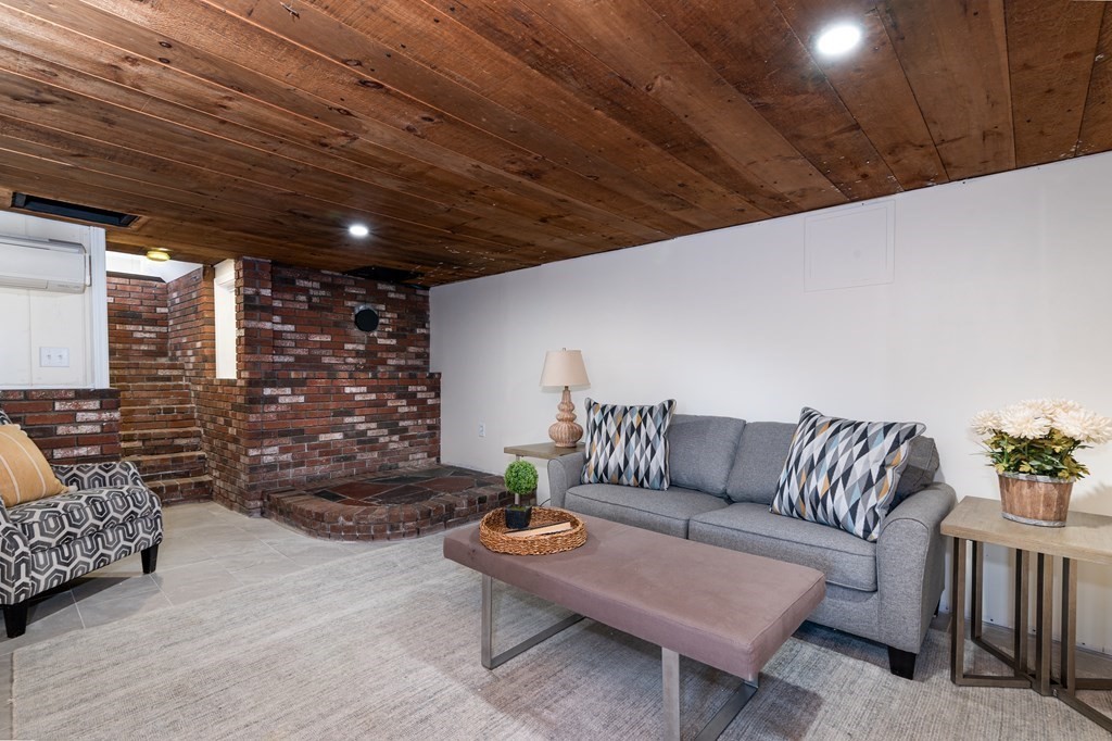 46 Oak Place Halifax, MA 02338 - Photo 25 of 42 a outdoor living space with furniture and a potted plant