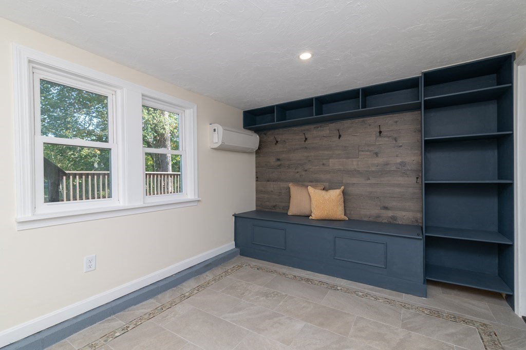 46 Oak Place Halifax, MA 02338 - Photo 27 of 42 a living room with furniture and a fireplace