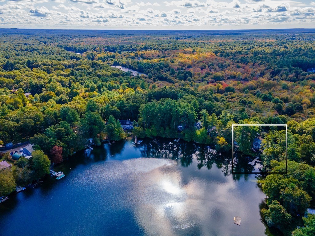46 Oak Place Halifax, MA 02338 - Photo 38 of 42 a view of a chairs and table in a backyard