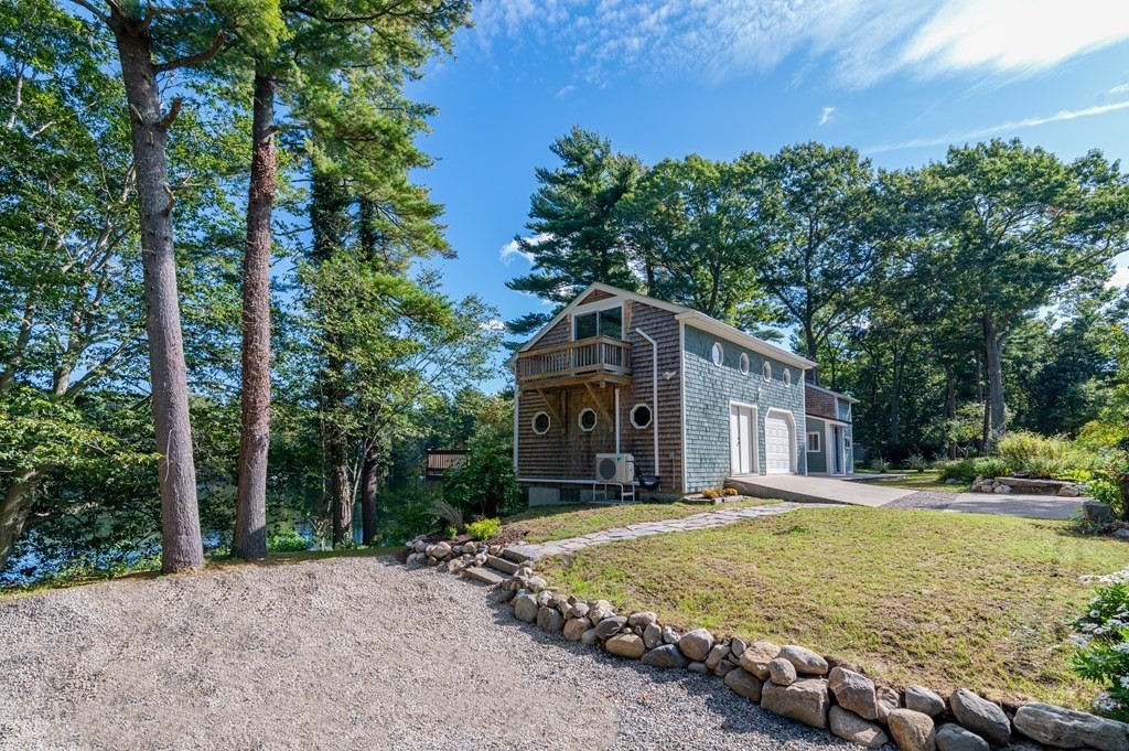 46 Oak Place Halifax, MA 02338 - Photo 4 of 42 a front view of a house with a yard