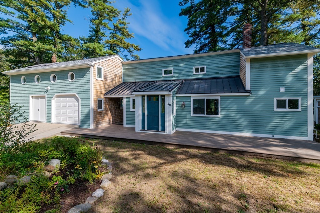 46 Oak Place Halifax, MA 02338 - Photo 5 of 42 a front view of a house with a yard
