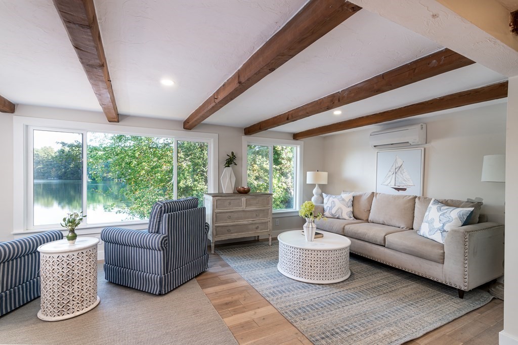 46 Oak Place Halifax, MA 02338 - Photo 6 of 42 a living room with furniture and a large window