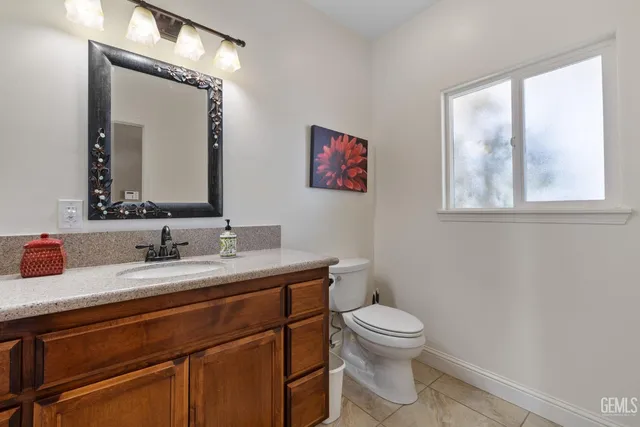 a living room with fireplace furniture and a fireplace
