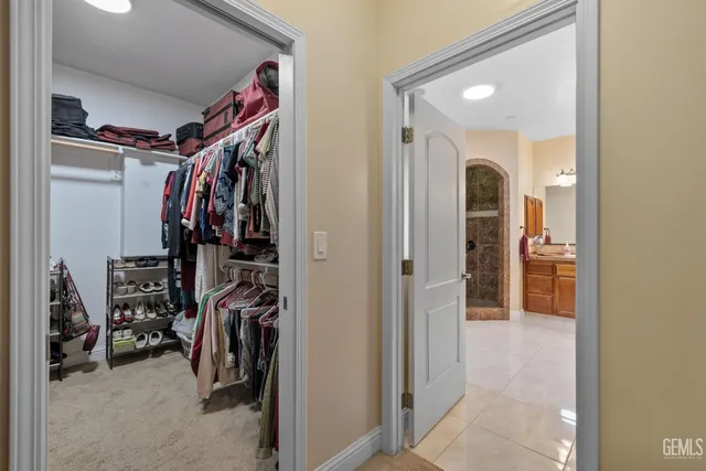 a bedroom with a bed and a table in it